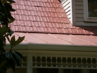 New shingle coated with traditional red top coat