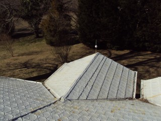 View of roof in 2010 showing splotches of rust