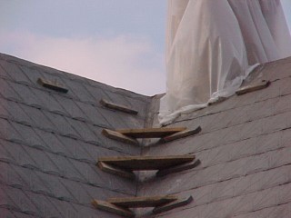 We repaired the chimney man's steps to roof ridge