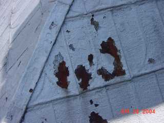 More rust and flaking shingles